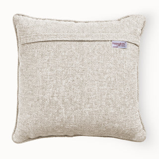 Back view of the cushion cover showing the solid beige velvet backing and concealed zipper.