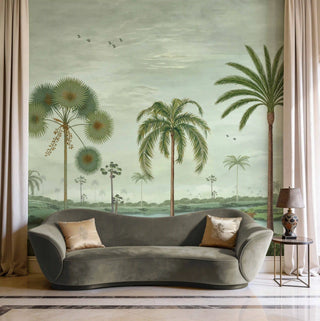 The Mosslight Morning sage mist mural styled as a grand feature wall in a contemporary living room behind a green velvet curved sofa view-livingroom