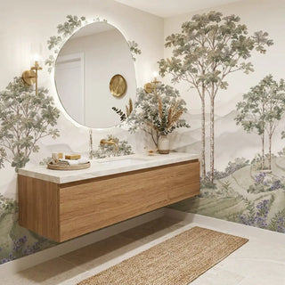 A full wall view of the Munnar customized heritage landscape wallpaper framing a luxury floating oak bathroom vanity view-powderroom