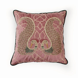 The full pattern layout of the Naqash-e-Mor cushion showing the symmetrical peacock embroidery and emerald green piping.