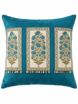 Front view of the Nayab velvet cushion cover in Teal, showing three embroidered flowering-spray panels edged with gold coin-sequin trim.