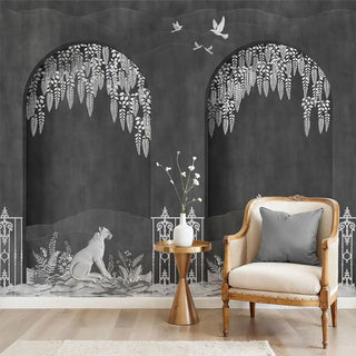 A luxury bedroom interior featuring the Neel Upvan Charcoal heritage mural as a statement headboard wall, paired with contemporary neutral furniture.