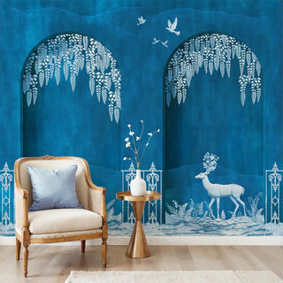 Neel Upvan Nature Wallpaper: Full mural of white arches, deer, and feline on a deep blue background in a living room setting.