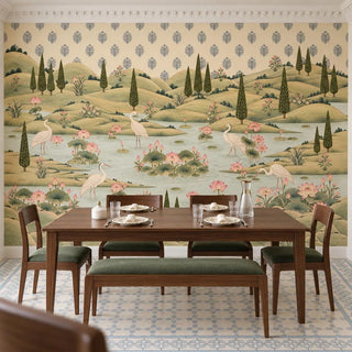 The Neer Kamal Pichwai wallpaper behind a walnut dining table and bench with green seats, cypress hills and a lotus pond above view-dining