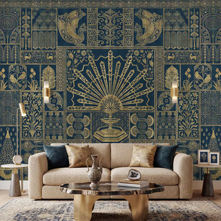 A "Nizam" Indian style wallpaper mural, showing a full view of the intricately patterned design in a golden-brown on a dark blue background, with a central fan-like motif and stylized animals. view-livingroom