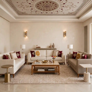 The Noor Mahal wallpaper mural applied overhead on a tray ceiling inside a modern luxury sitting room with cream sofas.