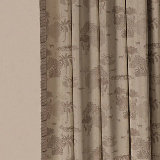 A detailed shot of the Nritya Fringes curtain fabric, showing the elegant, almost ghost-like design of trees and natural motifs up close.