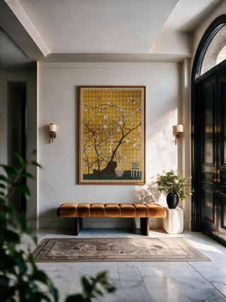The framed vertical Oriental Garden Chinoiserie wall art displayed above a tan velvet bench beside a black arched doorway.