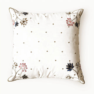 A top-down view of the Padma Leela cushion showcasing the full symmetrical layout of the embroidered lotus motifs.