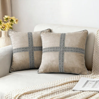 Two Cross Weave Cushion Covers styled on a white sofa with a knitted throw.