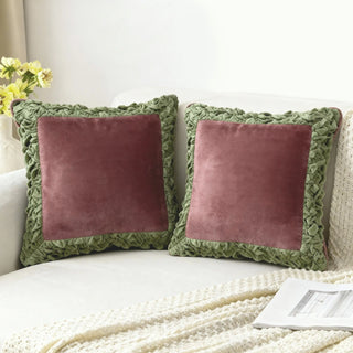 Two Gulaal Cushions styled on a white sofa with a knitted throw