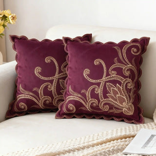 Two Royal Vine Cushion Covers styled on a white sofa with a scalloped edge.