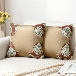 Two Rustic Frame Cushion Covers styled on a white sofa in a bright setting.