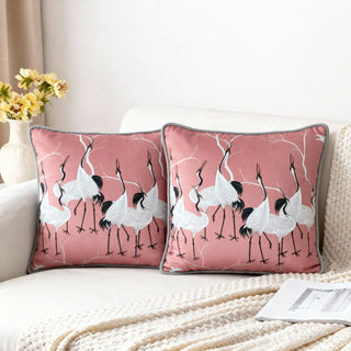 Two Sedge Cushions styled on a white sofa with a knitted throw.