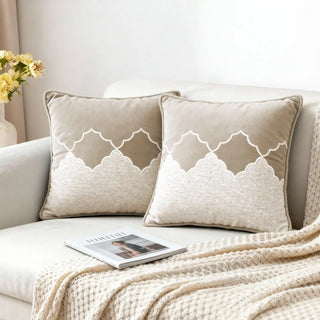 Two Sierra Lattice Cushion Covers styled on a white sofa with a knitted throw.
