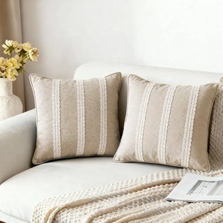 Two Stripe Lace Cushions styled on a white sofa with a knitted throw blanket.