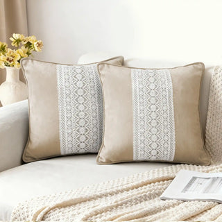 Two Serra Bloom Cushion Covers styled on a bright white sofa.