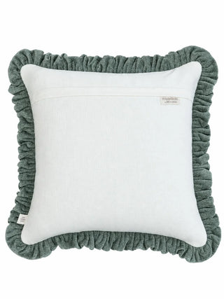 The back of the Palmora cushion cover: a plain ivory panel with an overlap seam, a Prasanaakshi by Life n Colors label and a dry clean only care label, framed by the sage ruffle.