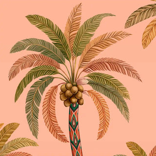 A detailed close-up of the Palmyra Breeze wallpaper in Peach showing a palm crown with coconuts and a patterned trunk on a coral-peach ground.