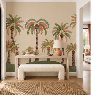 The Palmyra Breeze wallpaper mural in Sepia on an entryway wall, showing patterned-trunk palms behind a console table and bench. view-foyer