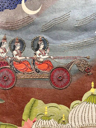 A detailed close-up of the Pichwai Palace embroidered wall art highlighting a haloed chariot under a crescent moon with gold-thread cloud lines