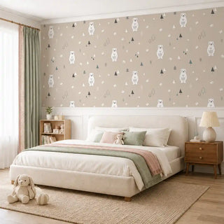 The Pinecone Path beige white wallpaper installed behind a cream upholstered bed with sage and pink linens in a kids bedroom view-kids