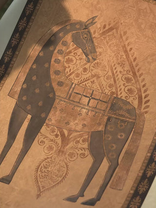 Video of Swarna Ashwa wall art in gold, showing the horse motif and fine detailing across the composition
