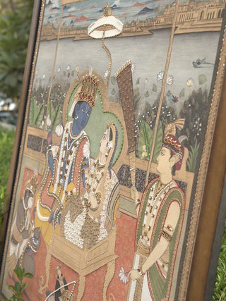 Ram Darbar embroidered wall art: Lord Rama and Sita in court beneath a canopy, with close-ups of Rama's blue face, crown and pearl work