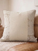 A full front view of the square Prose Pattern cushion cover showcasing its three-panel botanical layout and natural textures.