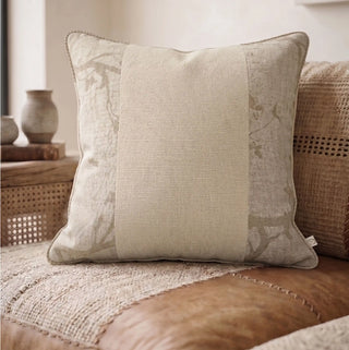 A full front view of the square Prose Pattern cushion cover showcasing its three-panel botanical layout and natural textures.