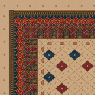 Close-up corner detail of Qarina ceiling mural showing the parchment ogee trellis field with alternating crimson and sapphire blue diamond medallions, pink lotus blooms at lattice intersections, the crimson scalloped arch border with gold garden sprigs, and the deep teal niche arch panel with flowering trees