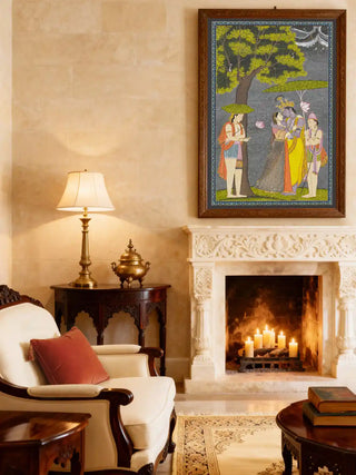 Radha Krishna divine mural styled above a white carved marble fireplace in a warm, traditional living room.