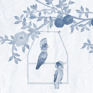Decorative wallpaper with parrots, flowers, and branches on a light blue background