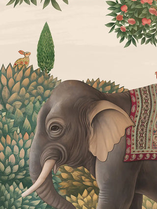 A close-up of the Rajasi Van wall art showing the elephant’s patterned red blanket, a floral rabbit and a pomegranate tree.