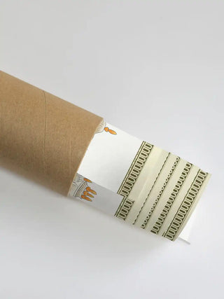 A section of the Rajasthani Rajah art showing the floral border detail partially unrolled from its protective shipping tube.