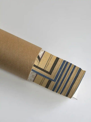 Ram Darbar embroidered wall art shown rolled in protective shipping tube packaging