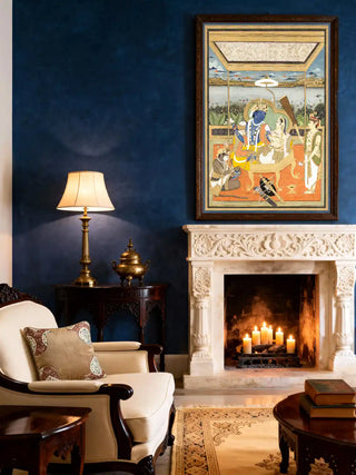 A large-scale Ram Darbar mural framed above a white carved fireplace with a navy blue accent wall and ivory armchair