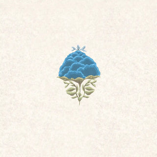 A detailed close-up highlighting the hand-painted blue and sage floral buta motif on the textured cream Rani wallpaper.