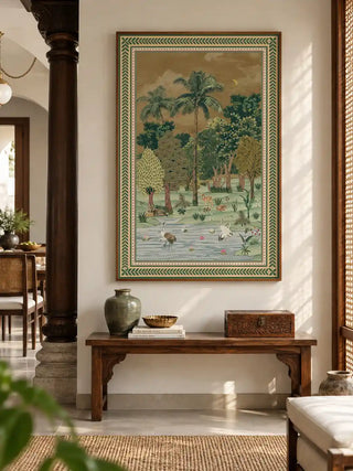 The Ranthambore Forest vertical wall art framed above a wooden console table with a brass bowl and urn.