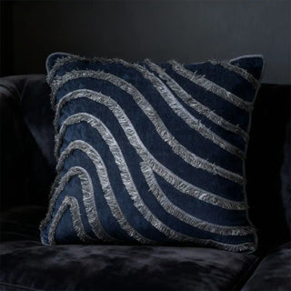 Single Regal Wave Cushion displayed on a dark velvet chair for a rich, moody look.