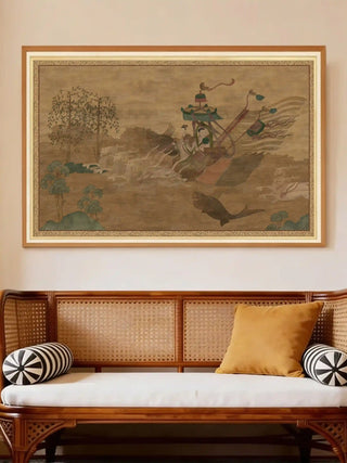 River Embrace wall art styled in a gold frame above a classic cane-backed daybed with a mustard yellow cushion.