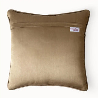 Back view of the cushion cover showing the solid beige velvet backing and concealed zipper.