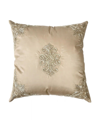 Front view of Rocaille Charm cushion cover in champagne satin showing central acanthus medallion and corner embroidery.