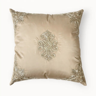 A full front view flat lay of the square Rocaille Charm cushion cover showcasing its symmetrical Baroque medallion and metallic leaf corners.