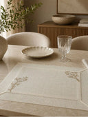 A luxury full outdoor tablescape setting displaying the coordinated Rooted Grace linen table runner and matching embroidered placemats.
