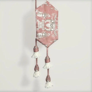 Close-up shot of the Rosette Royale Holdback hanging, highlighting the full repeat pattern of the silver embroidered crest design on the velvet.