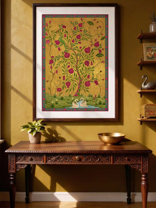 The Royal Bagh art print styled in a dark frame on an ochre wall above a carved wooden console table.