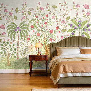 A luxury bedroom featuring The Royal Bagh cream mural behind a green velvet headboard.