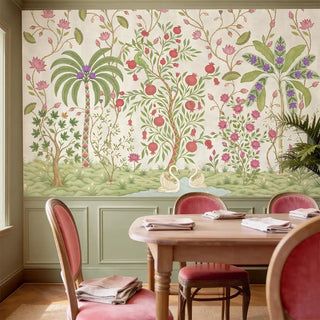The Royal Bagh cream mural styled in a luxury dining room with green wainscoting and pink chairs.
