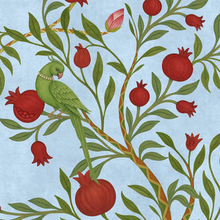 Close-up of The Royal Bagh mural showing a hand-painted green parrot perched on a pomegranate branch.